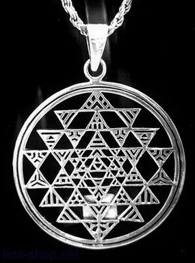 Metal amulet to attract good luck in the form of a pendant