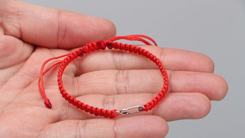 Red thread amulet can bring good luck