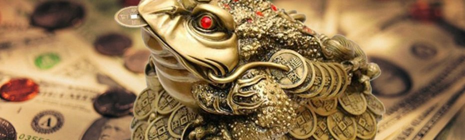 A toad with coins in its mouth - a talisman that attracts money