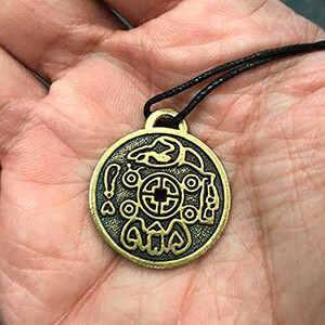 the amulet on the palm of the hand